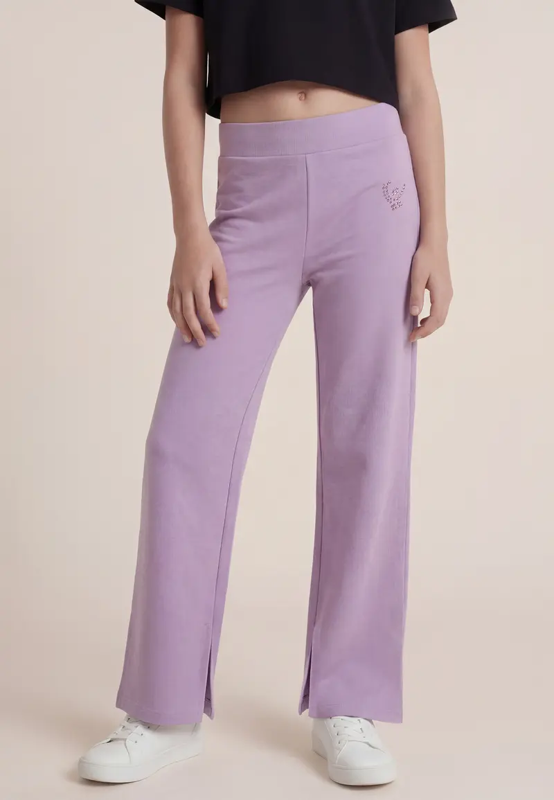Leggings flare in jersey con spacchi sul fondo