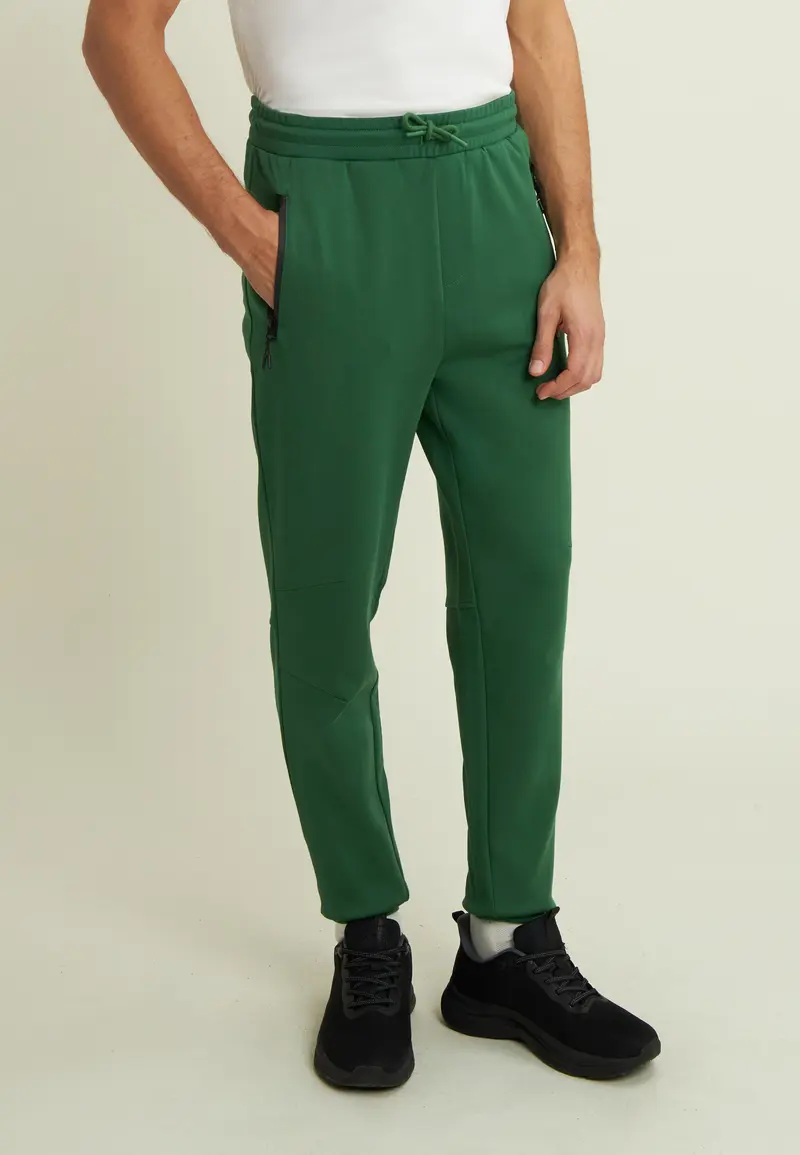 Pantaloni a carota in interlock con zip laterali
