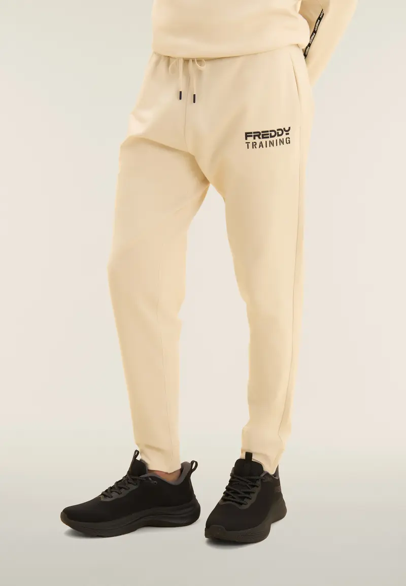 Pantaloni slim cropped con fondo in costina