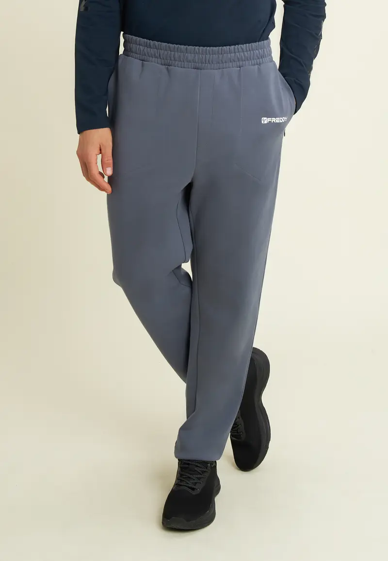 Pantaloni slim in interlock con dettagli lucidi