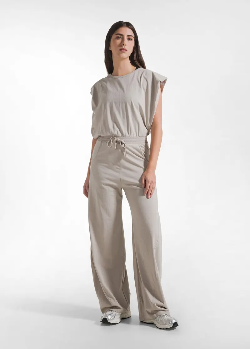 TUTA JUMPSUIT IN JERSEY CON APERTURA SUL RETRO BEIGE
