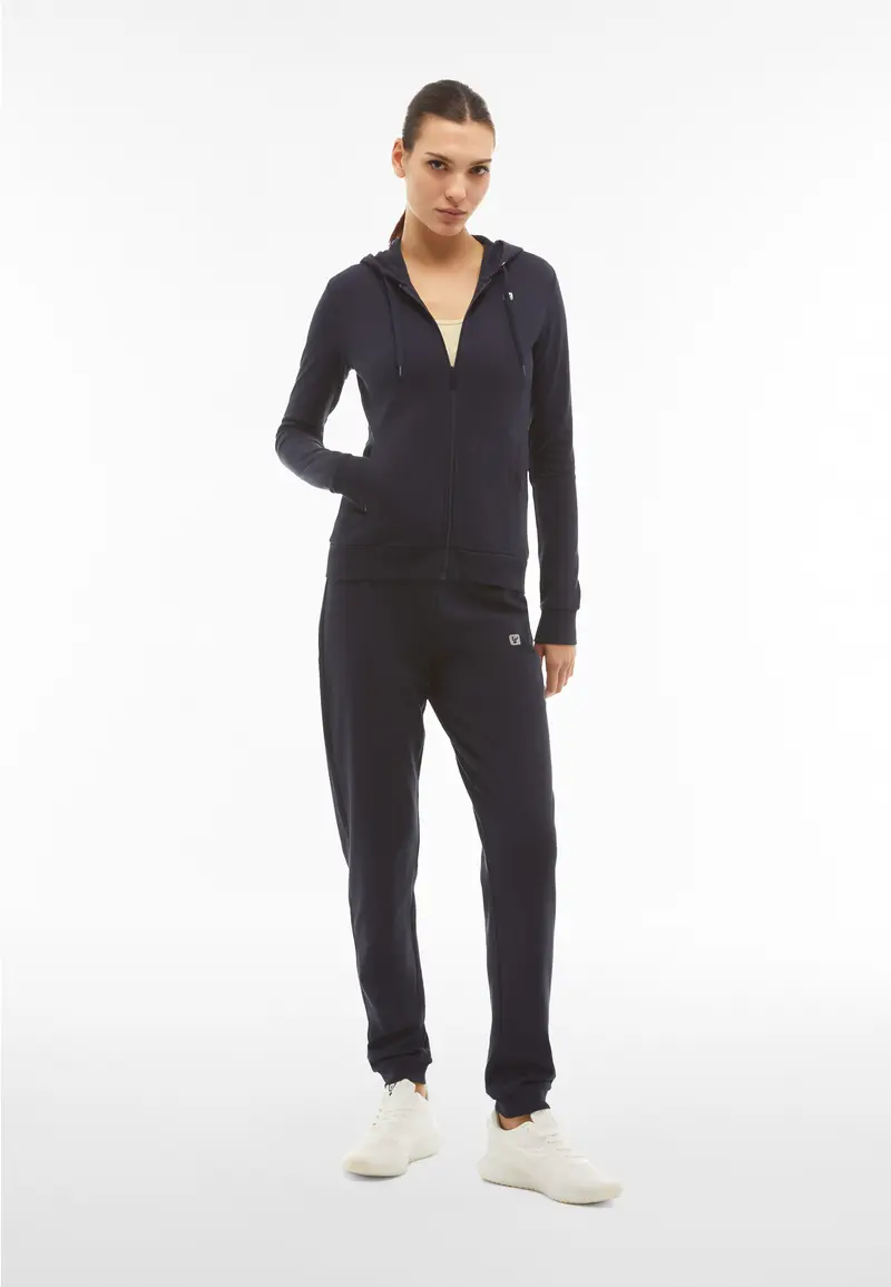 Tuta sportiva in interlock con felpa cappuccio e zip